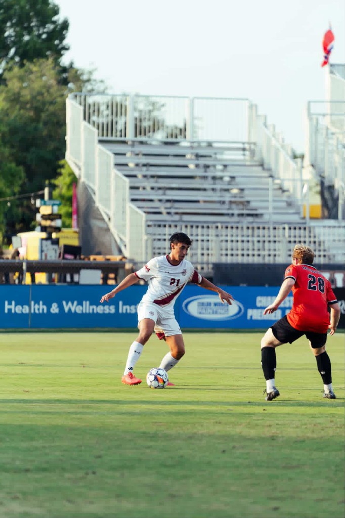 Soccer player in action on the pitch